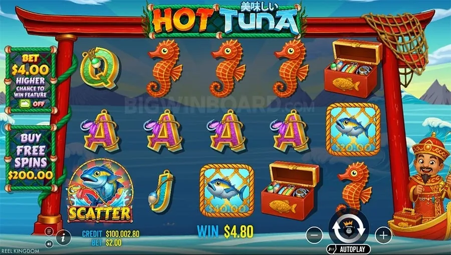 Player's hands placing chips on a roulette table with strategy guide